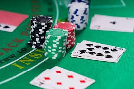 Multi-game dashboard showing live table and slot options