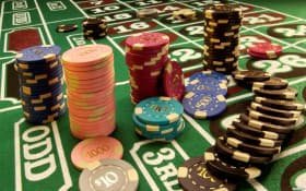 Mega Sevens live dealer table with card layout and betting positions
